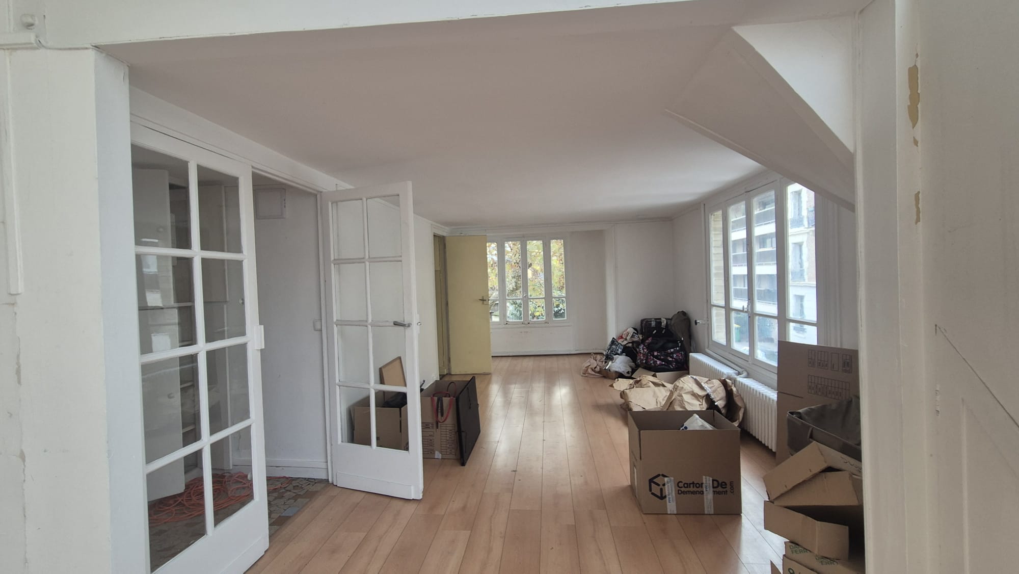 Avant — Séjour double hauteur duplex Paris 9e